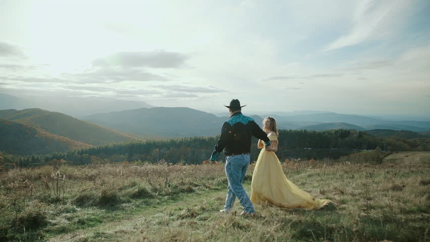 Fall on Max Patch Mountain Appalachian Mountains, Tennessee & North Carolina, young couple, woman in yellow dress, cowboy in hat 4k