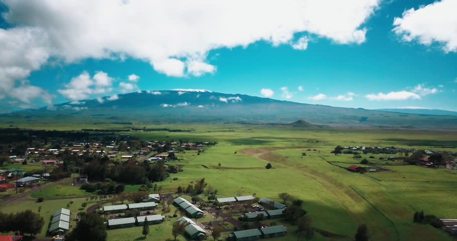 Drone aerial looking at Mauna Kea Hawaii volcano Royalty-Free Stock Footage #1006941223