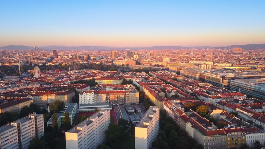 drone aerial view vienna flying sideways over leopoldstadt district at sunrise Royalty-Free Stock Footage #1006947790