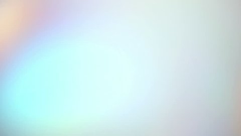 Holographic foil abstract rainbow pastel colored motion graphic background slowly moving