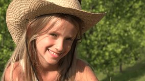 Laughing Child Relaxing Outdoor on Grass, Happy Girl Face Portrait in Nature 4K