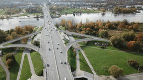 Cars on river Daugava bridge Riga Latvia aerial drone top view view 4K UHD video 