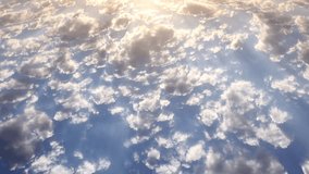 Air plane window view time lapse clouds & blue sunny sky, Loop of white clouds over blue sky with sun Rays, Aerial view, drone shooting clouds motion time, nature blue sky & white cleat weather. UHD.