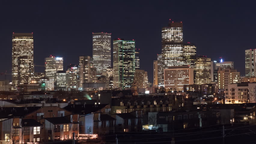 Slow pan of Denver Skyline at night timelapse. 