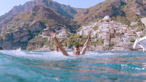 Muscular Young Friends Men Jumping Into The Ocean Summer Fun Holiday Leisure Slow Motion Underwater Shot Red Epic 8k