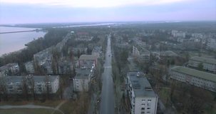 aero video shooting. The city on the banks of the Dnieper River. Ukraine-Svetlovodsk. Old houses of the times of the USSR. Cloudy day, autumn weather. Summer morning cityscape from a bird's eye view. 