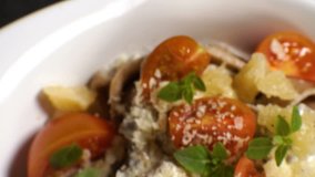 Ready-made pasta dish with mushroom sauce. Video