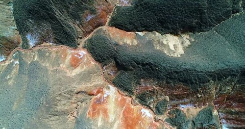 World’s most amazing places. Aerial top down view on the colorful rainbow mountains of Zhangye Danxia landform geological park in Gansu province. Part 4 of a 9 part series-can be merged into 1 movie