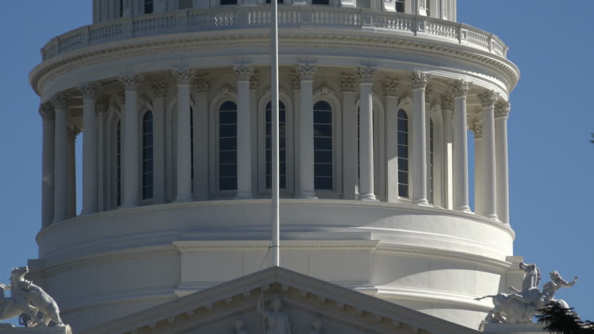 Sacramento State Capitol Building, California, USA, zoom out to yellow roses.