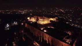 Aerial drone bird's eye video of iconic Parthenon in Acropolis hill, Athens historic center, Attica, Greece