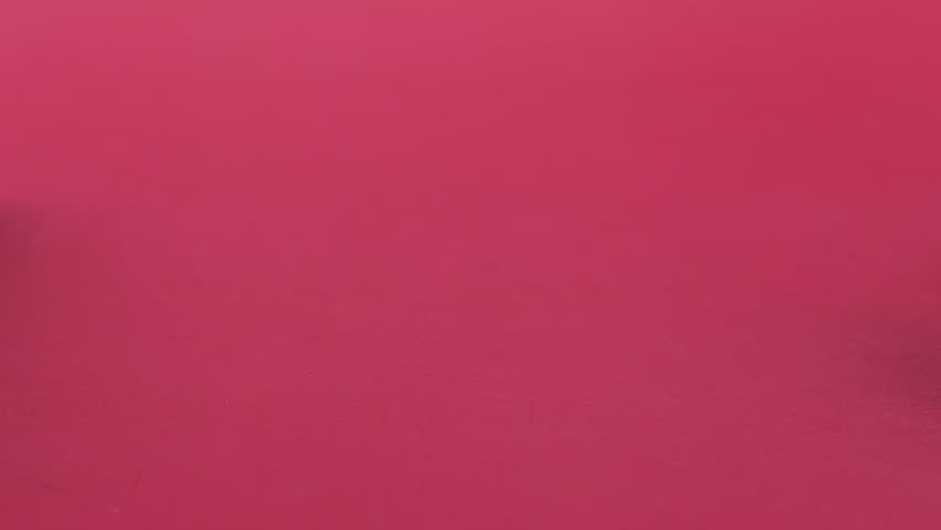 Chinese New Year : Golden ingot decoration and pile of red envelope with Chinese language means of lucky and wealth on red background