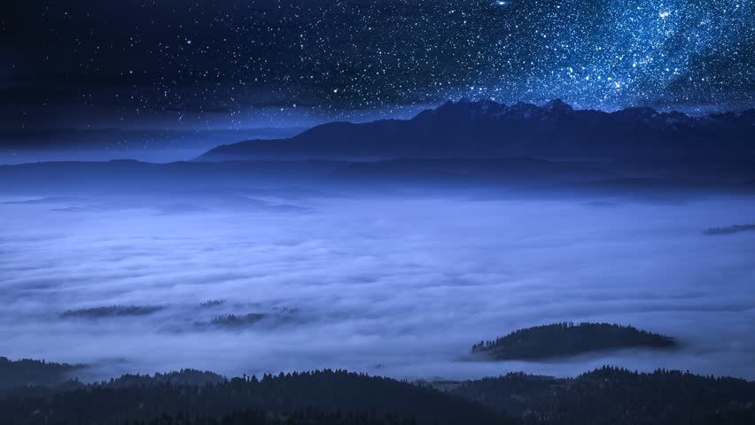 Stunning milky way and flowing clouds in the Tatra Mountains, Poland | Shutterstock HD Video #1007084575