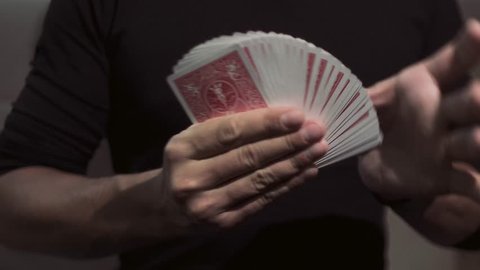 Professional Street Magician Performs Impressive Sleight of Hand Card Trick.