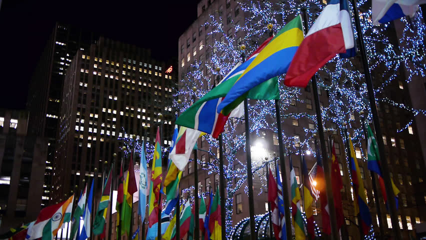 Flagpoles display flags of United Nations member countries around the Rockefeller Plaza, New York City.