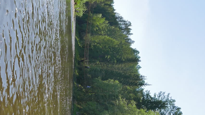 Vertical video. Hanging Bridge, River Serga, Urals, Russia