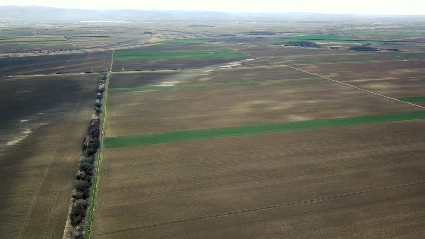 Aerial fields in early spring., an Industrial Video by Allexxandar