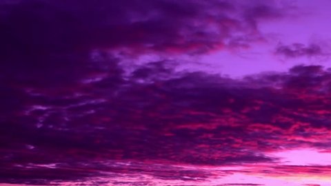 Sunset purple time lapse clouds, fast move in evening time, very beautiful real clourful weather, rain, storm day. Orange, red, yellow, trutty, puffy, fluffy. FHD.