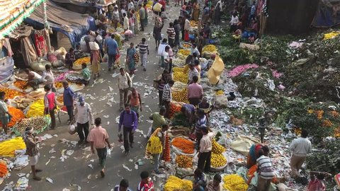 Kolkata,West Bengal,India February 3rd,2018 Top view of flower market at Malik Ghat near Howrah Bridge by the side of River Ganga in Kolkata