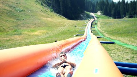 Summer adrenaline park, inflatable water tobooggan slide in Bansko Bulgaria