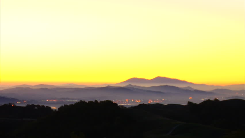 This is a locked off shot of a golden Napa Valley sunrise.