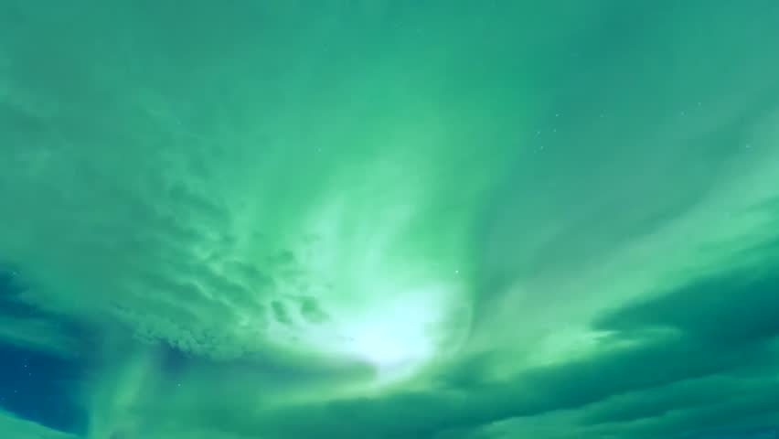 Burning bright brilliant aurora borealis reflecting ocean breaking waves Iceland 4k, Northern Lights on the Arctic sky, Aurora borealis lights, arctic northern light in blue sky, night arctic. UHD. | Shutterstock HD Video #1007137081
