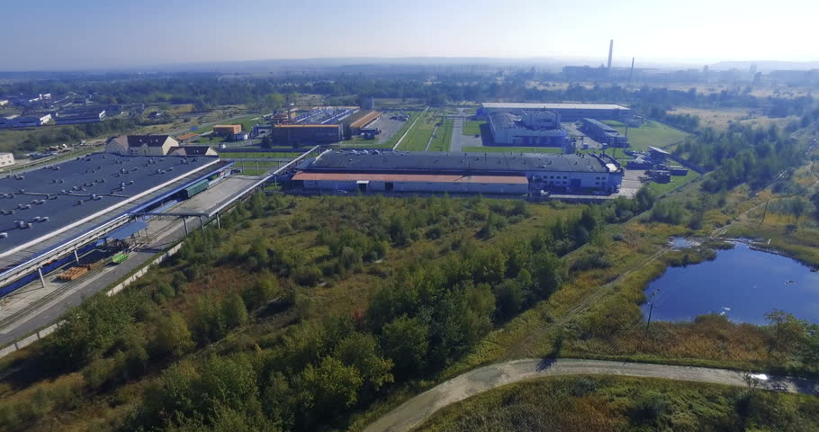 Aerial shooting landscape of the lake forest factory amazing colors view blue sky drone panoramic view forest helicopter panorama water summer nature air bird clouds prevention landing