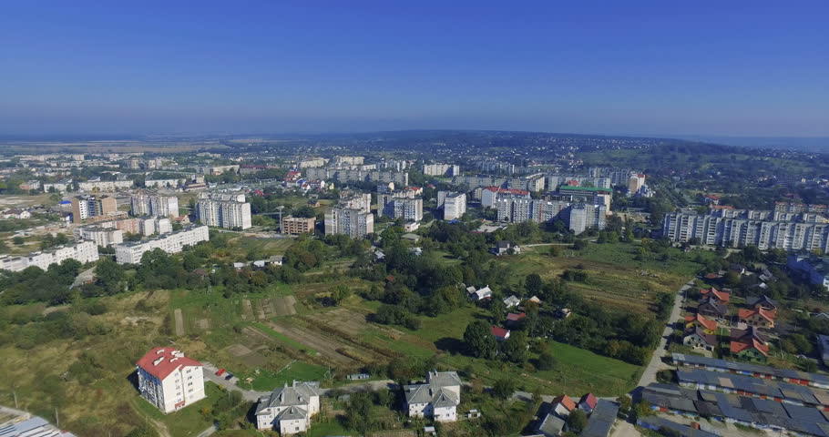 Aerial shooting landscape of the city amazing colors view blue sky drone panoramic view helicopter town panorama summer nature air bird clouds factory landing building environment industry