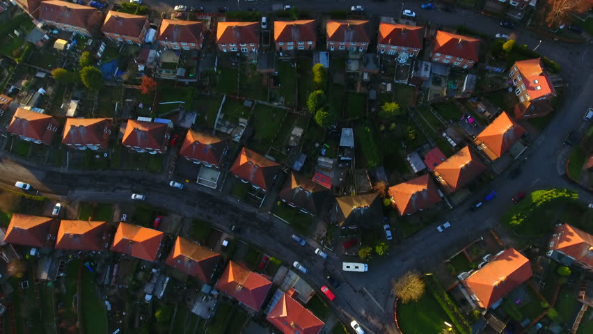 Aerial drone shot of British housing council estate in the UK, English house and homes from above, semi detached  Royalty-Free Stock Footage #1007160469