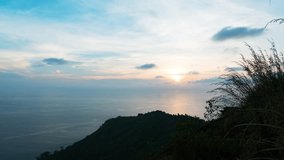 4K-time lapse of sunset sky and clouds over andaman tropical sea