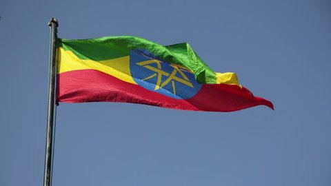 in  ethiopia africa the colorful flag waving in the sky
