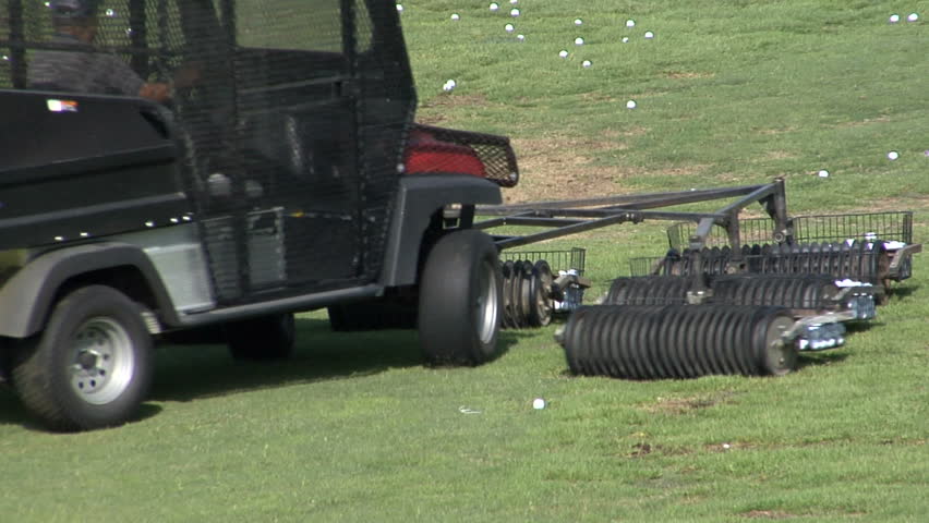 a golf ball picker-upper at a driving range