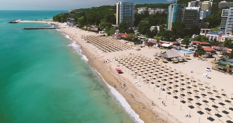 4k aerial video of the beach in Golden Sands, Zlatni Piasaci. Popular summer resort near Varna, Bulgaria
