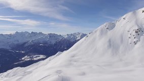 SWISS ALPS // Snowy Mountain Peaks // Aerial Footage - Riprese Aeree // 4K
Amazing drone flight over the snowy Swiss Alps, beautiful mountain peaks and ski resorts.