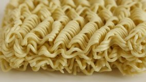 Surface of Chinese type  noodles close-up 4K 2160p 30fps UltraHD tilting footage - Instant food block ready for cooking slow tilt 3840X2160 UHD video
