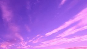 Timelapse of beautiful pink sunset sky turning to blue evening sky 4k cloudscape footage, purple clouds time lapse, beautiful cloudy motion. Beautiful pinc sunset sky turning to blue evening skies. 4K