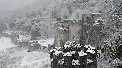 Gwrych Castle in snow, British European castle Snowing gently and covered in snowy winter landscape 3 of 6 I'm a celebrity