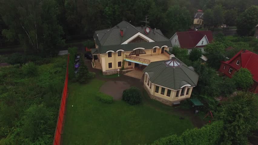 Cottage building aerial at rainy day