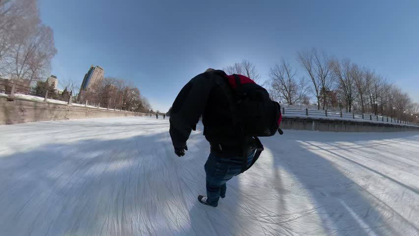 Skater rushing down the Ottawa Rideau Canal