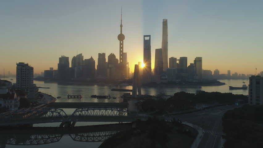 Panoramic Shanghai Skyline at Sunrise. China. Aerial View. Drone is Flying Forward over Monument to the People's Heroes. Establishing Shot.
 Royalty-Free Stock Footage #1007252524