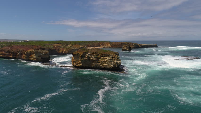 Drone tracking over the rocky coastline of Peterborough, Victoria, Australia.