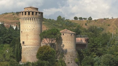 Medieval castle towers in Brisighella, a small town immersed in the woods.