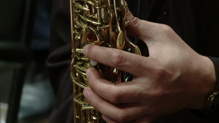 Close-up part of instrument soprano saxophone while playing music. Royalty-Free Stock Footage #1007272384