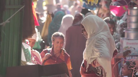 ETHIOPIA - CIRCA -2011: Muslim woman shopping in open Air Market, Mercato, Ethiopia, Addis Ababa, Africa