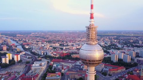 Germany Berlin Aerial v31 Flying low around Berliner Fernsehturm tower cityscape views sunset 8/17