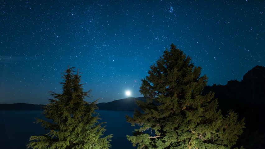 Moonrise reflected on Crater Lake National Park