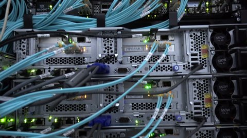 MOSCOW, RUSSIA - February 3: Optical server. Commutator. flashing lights. Optical fiber. Severs computer in a rack at the large data center. on February 3, 2018 in Moscow, Russia. Editorial. 