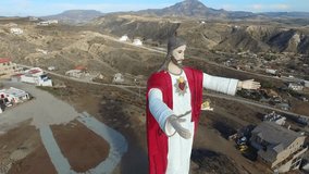 Aerial view of Christ of the Sacred Heart statue in the town of El Morro, south of the city of Rosarito, Baja California, Mexico.