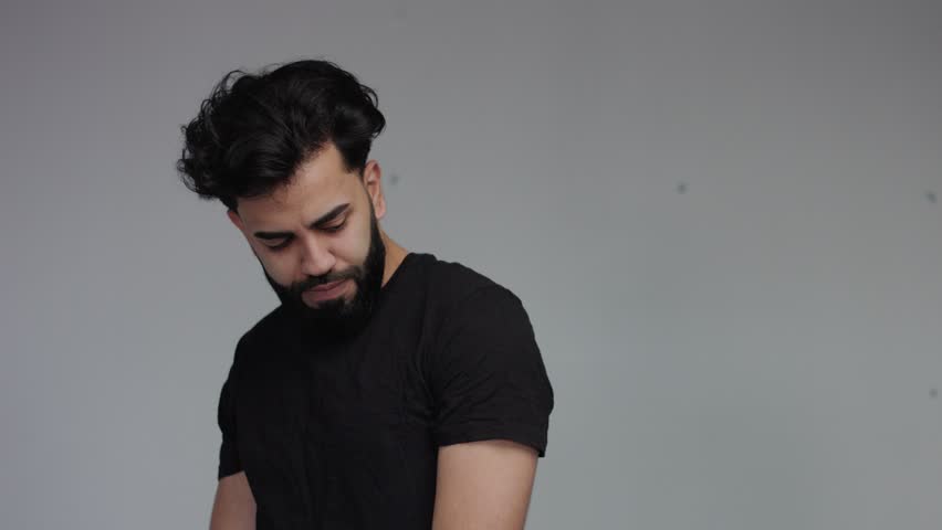 paranoic strange stressed man lookin weird aside