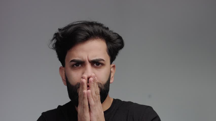 paranoic strange stressed man lookin weird aside