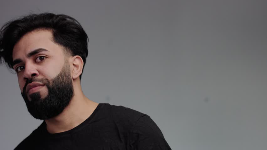 paranoic strange stressed man lookin weird aside